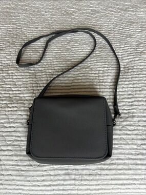 Crossbody purse/bag charcoal gray with multiple compartments, minimalist. 4x6”